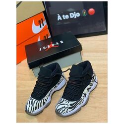 Air Jordan 11 Animal Instinct