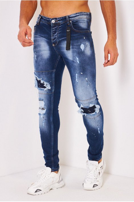 Jean bleu déchiré et taché